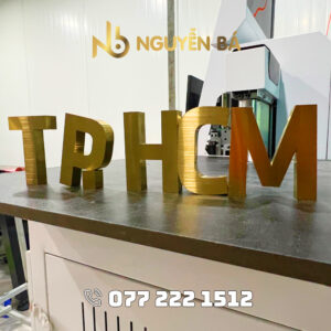 Gia công chữ inox vàng xước ngang